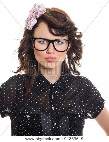 Portrait Of An Angry Woman Looking At Camera Isolated On A White Background