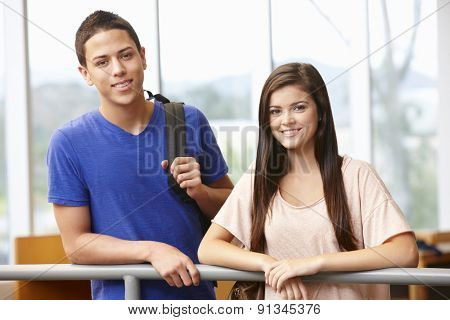 Teenage student girl and boy indoors