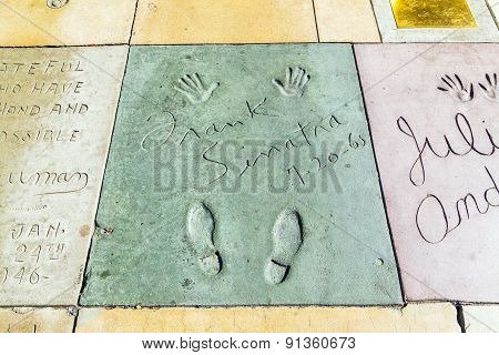 Handprints In Hollywood Boulevard In The Concrete Of Chinese Theatre's Forecourt