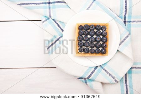 Tartlet with bluebarries and custard
