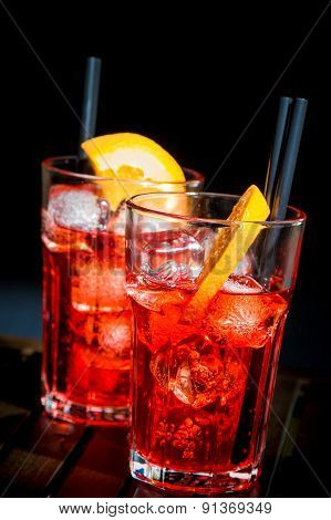 Spritz Aperitif Aperol Cocktail With Orange Slices And Ice Cubes On Black Background