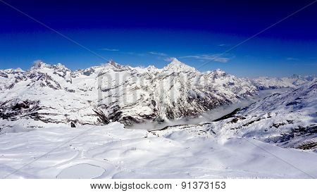 Snow Alps Mountains View And Blue Sky