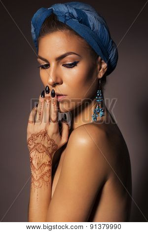 Beautiful Sexy Blonde Woman With Make Up And Mehendi Tattoo Topless On Dark Background