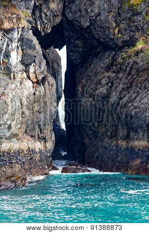 Rock Arch At Sea's Edge
