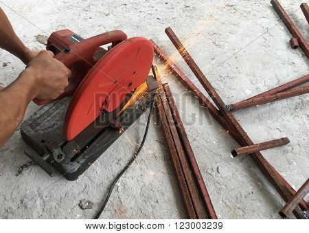Man using steel cutters work. Construction technician