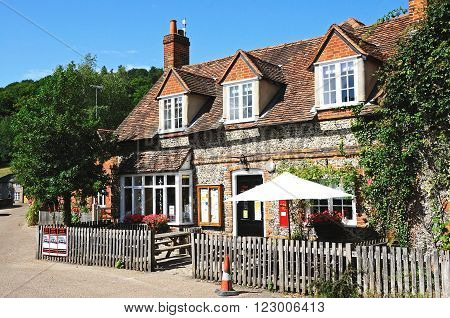 HAMBLEDON, UK - JULY 10, 2015 - View of the village shop post office and cafe in the centre of the village Hambledon Oxfordshire England UK Western Europe, July 10, 2015.