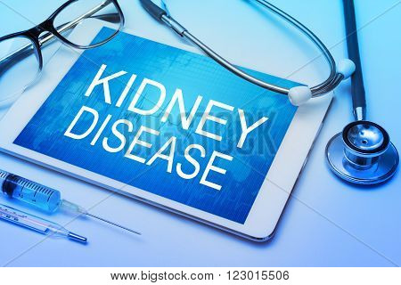 Kidney Disease word on tablet screen with medical equipment on background
