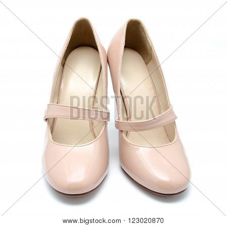 Biege high heel woman shoes isolated on a white
