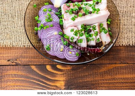 Fresh Pork Fat, With Red Hot Chili Peppers, Green And Purple Onions And  Peas Allspice Beautifully L