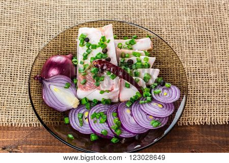 Fresh Pork Fat, With Red Hot Chili Peppers, Green And Purple Onions And  Peas Allspice Beautifully L
