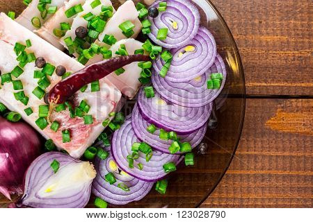 Fresh Pork Fat, With Red Hot Chili Peppers, Green And Purple Onions And  Peas Allspice Beautifully L