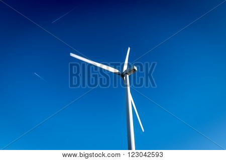 Windmill in a clear and blue sunny summer's sky