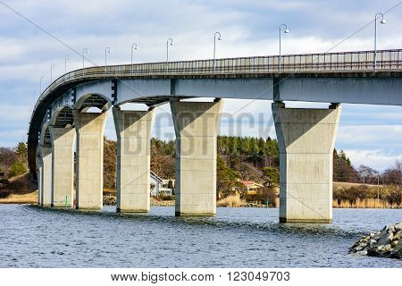 The underside of the Senoren bridge in the Blekinge archipelago of Sweden. Sun is shining on the pillars.