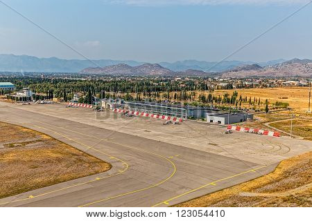 PODGORICA, MONTENEGRO - AUGUST 11, 2015: Aerial view of the airport building aerial on sunny summer day.