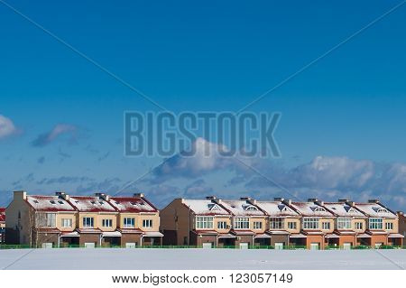City landscape in the winter with a view of the houses along the street Agakova Cheboksary Chuvash Republic Russia. February 28 2016