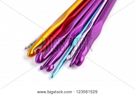 Multicolored crotchets of different size on white background