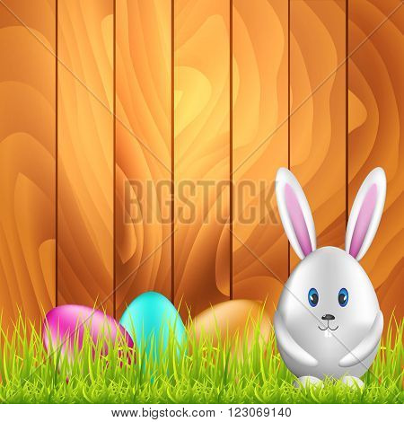 Easter bunny egg and colorful eggs on spring meadow. Easter background with space for text. Vector illustration