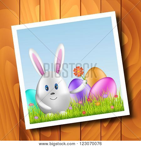 Easter bunny egg and colorful eggs on spring meadow. Easter background with space for text. Vector illustration