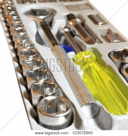 set of metallic tools head keys and a pen