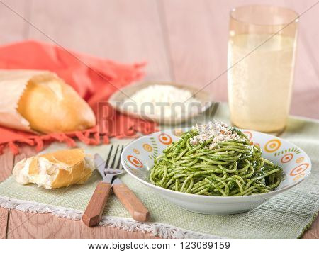 Pasta with pesto sauce, tallarines verdes,a typical dish form Peru