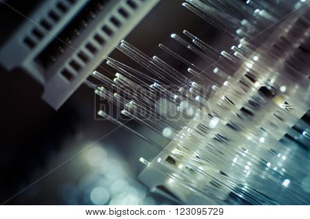 Optics. Fiber optic cables, fibre connection, telecomunications concept.