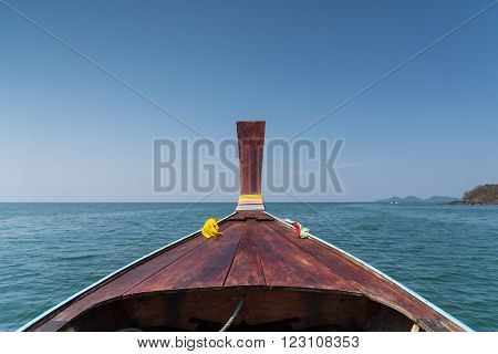 Thai Wooden Head Longtail Boat Heads Toward