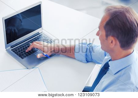 business, office, school and education concept - smiling businessman working in office