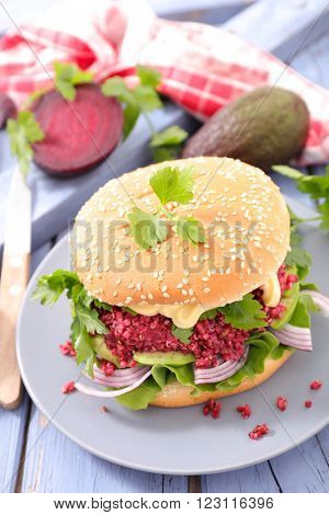 buger with quinoa beetroot steak and salad