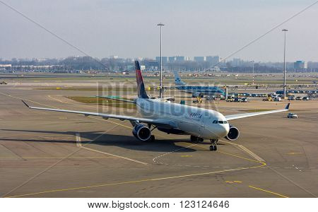 Amsterdam North Holland/the Netherlands - March 10 2016: Schiphol Airport KLM passenger aircraft on the runway