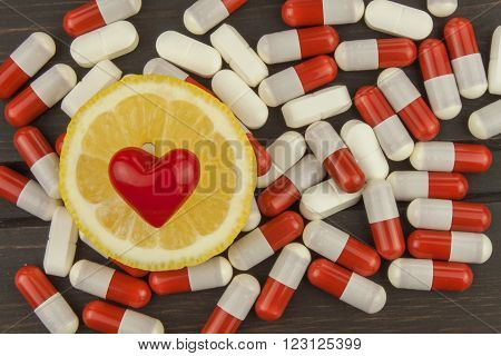 Lemon as a symbol of vitamin c. Additives dietary supplements.