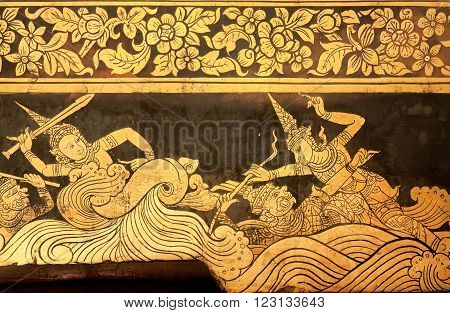 BANGKOK, THAILAND - FEB 14: Old fresco of Wat Pho temple with angry warriors fighting with evil magical powers on February 14, 2015. Wat Pho is a Buddhist temple complex founded in 16th century