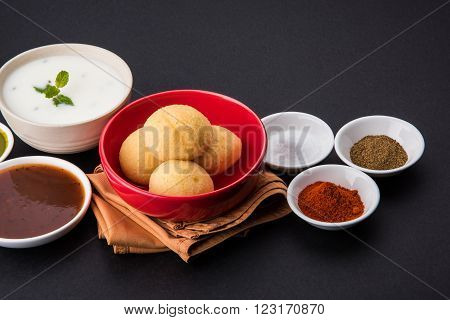 dahi vada or dahi vade also known as Curd Vadai in South India, a popular snack famous all over India prepared by soaking lentil vadas in thick dahi or yogurt, topped with spicy & sweet chutney etc