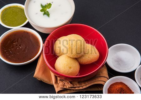 dahi vada or dahi vade also known as Curd Vadai in South India, a popular snack famous all over India prepared by soaking lentil vadas in thick dahi or yogurt, topped with spicy & sweet chutney etc