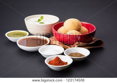 dahi vada or dahi vade also known as Curd Vadai in South India, a popular snack famous all over India prepared by soaking lentil vadas in thick dahi or yogurt, topped with spicy & sweet chutney etc