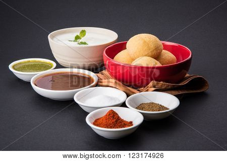 dahi vada or dahi vade also known as Curd Vadai in South India, a popular snack famous all over India prepared by soaking lentil vadas in thick dahi or yogurt, topped with spicy & sweet chutney etc