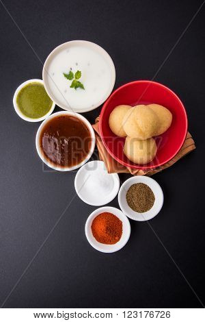 dahi vada or dahi vade also known as Curd Vadai in South India, a popular snack famous all over India prepared by soaking lentil vadas in thick dahi or yogurt, topped with spicy & sweet chutney etc