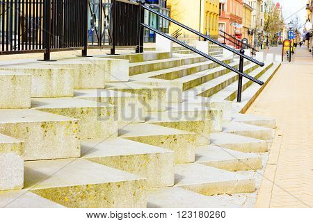 Kristianstad Sweden - March 20 2016: Granite stairs on a small town square one fine spring day.