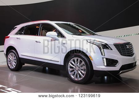 NEW YORK - March 23: A Cadillac XT5 exhibit at the 2016 New York International Auto Show during Press day,  public show is running from March 25th through April 3, 2016 in New York, NY.