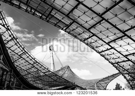 MUNICH GERMANY - SEPTEMBER 14 2012: Detail of the roof of the Olympia stadion constructed in 1972. The lightweight tent construction of the Olympia stadion was considered revolutionary for its time.