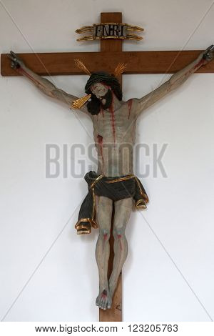 PRIMISWEILER, GERMANY - OCTOBER 20: Crucifixion, church of St. Clement in Primisweiler, Germany on October 20, 2014.