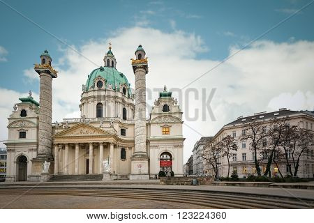 Karlskirche baroque church on Karlsplatz Vienna Austria. Blue cloudy sky in background. Europe travel.