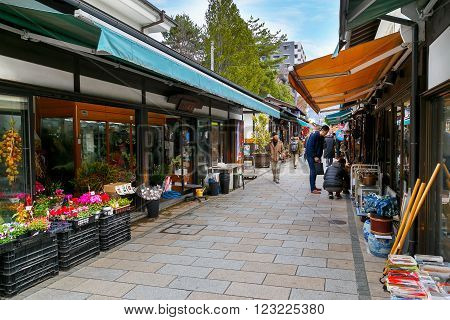 MATSUMOTO JAPAN - NOVEMBER 21 2015: Nawate Dori a shopping street that gives the feel of city's history as a castle town with around 50 shops vary from antique dealers and 'dagashi' candy stores