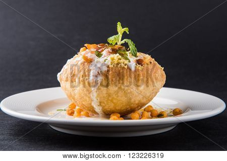 Rajasthani Shahi Raj Kachori, stuffed katchori with potato and sprout filling and served with curd, chutney and sev
