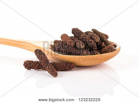 closeup long pepper on white background. food