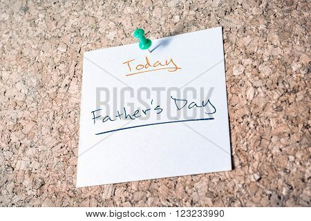 Father's Day Reminder For Today On Paper Pinned On Cork Board