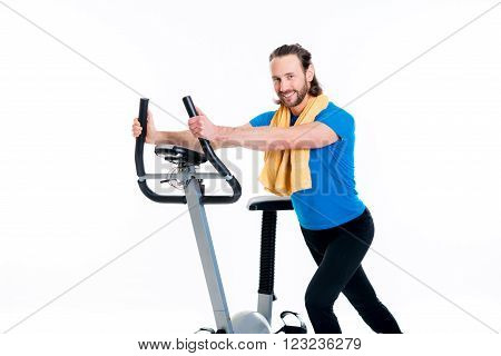 Young Man Train With Fitness Machine