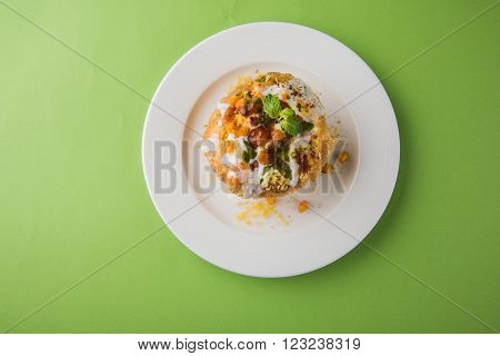 Rajasthani Shahi Raj Kachori, stuffed katchori with potato and sprout filling and served with curd, chutney and sev