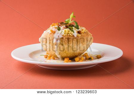 Rajasthani Shahi Raj Kachori, stuffed katchori with potato and sprout filling and served with curd, chutney and sev