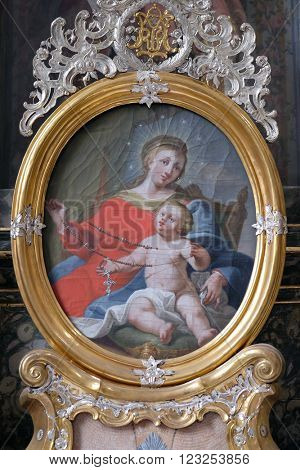 URSBERG, GERMANY - JUNE 09: Virgin Mary with baby Jesus, altarpiece in the monastery church of St. John in Ursberg, Germany on June 09, 2015.