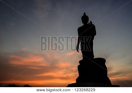 Silhouette of standing big Buddha statue during twilight time
